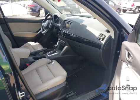 2015 Mazda Cx-5 Grand Touring z USA, uszkodzony, nr VIN JM3KE4DY0F0447686